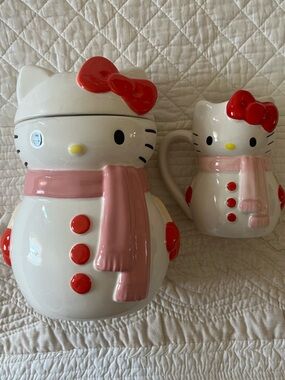 Hello Kitty Ceramic Snowman Canister and Matching Mug.